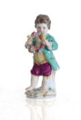 A Meissen figure of a young boy, 19th century,