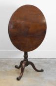 A George III mahogany tripod table, Mid 18th century,