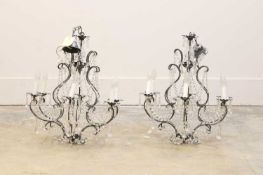 A pair of modern silvered chandeliers, of modern manufacture,
