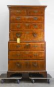 A figured walnut inlaid chest on chest, 18th century,