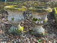 A pair of composite campagna urns, 20th century,