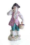 A Meissen porcelain figure of a young grape gatherer, 19th century,