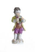 A Meissen figure of a young boy, late 19th century,
