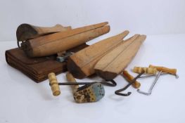 A collection of riding boot trees and riding boot pulls, 20th century,