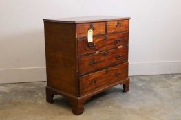 A George III mahogany chest of drawers, 19th century,