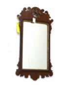 A Georgian mahogany and parcel gilt fret carved mirror, mid 18th century,