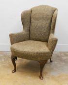 A George II style wingback armchair,