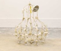 A cream painted chandelier, of modern manufacture,