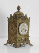 A Victorian gilt metal and pierced mantel clock, late 19th century,