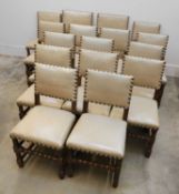 A set of sixteen oak dining chairs, early 20th century,