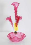 A Victorian cranberry glass four-trumpet epergne,