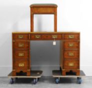 A mahogany campaign style desk and matching stool, of recent manufacture, in the 19th century style,