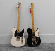 A Squier Telecaster electric guitar, of modern manufacture,