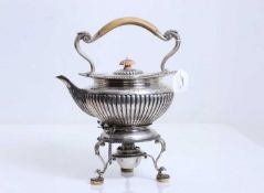A silver spirit kettle on stand,