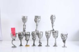 A collection of Royal Selangor pewter goblets,