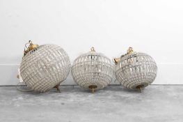 A group of three cut-glass globe chandeliers, of recent manufacture,