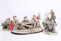 Four Capodimonte figure groups, 20th century,
