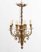 An eight branch gilt chandelier, early 20th century,