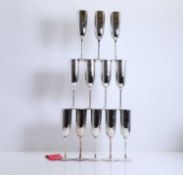 A collection of twelve silver champagne flutes,