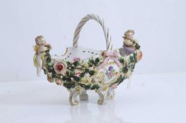 A Continental porcelain basket, late 19th to early 20th century,