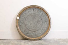 A large brass charger, Persian, 20th century,