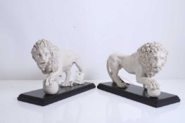 A pair of classical style alabaster models of the Medici Lion, late 19th to early 20th century,