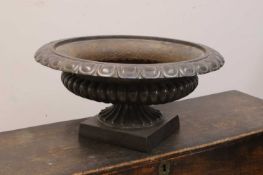 A steel pedestal urn, 19th century,