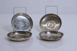 Four silver one rupee coin inlaid pin dishes, late 19th/ early 20th century,