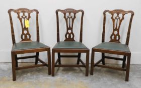 Three Chippendale style mahogany dining chairs,