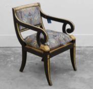 A Regency-style painted and parcel-gilt wooden elbow chair, late 19th to early 20th century,