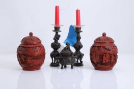 A pair of Chinese cinnabar lacquer and enamelled vases and covers, circa 1900,