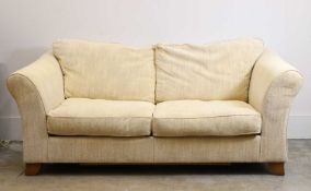 A two seater sofa bed, of recent manufacture,