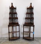 A pair of 'Chinese Chippendale' style mahogany corner display cabinets, late 19th to early 20th cent