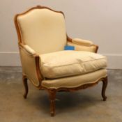 A French walnut fauteuil, 20th century,