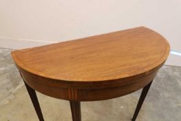 A George III mahogany and satinwood card table, third quarter of the 18th century,