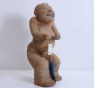 A Chinese pottery figure, in the Han-dynasty style,