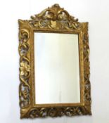 A Baroque-style carved giltwood pier mirror, second half of the 19th century,