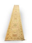 A pale wool Oushak style runner, 20th century,
