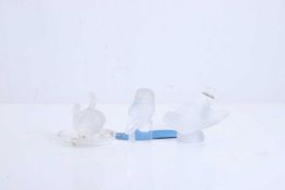 A Lalique satin glass bird,