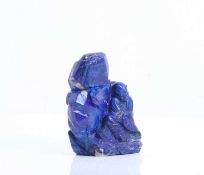 A Chinese carved lapis lazuli figural group, 20th century,