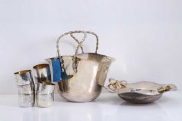 A plannished white metal champagne basket,
