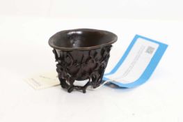 A Chinese carved wood libation cup, Qing dynasty (1644-1911),