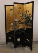 A four-fold carved and lacquered screen, 20th century,