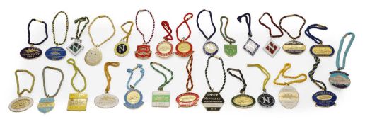 A collection of Newmarket Annual Membership badges,