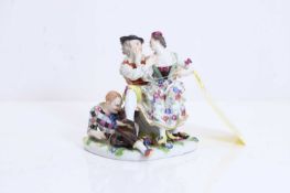 A Meissen figure group, c.1870, 'The indiscreet Harlequin',