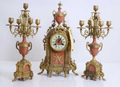 A French gilt metal and marble clock garniture, late 19th century,