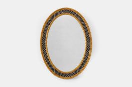 A George III carved giltwood and verre églomisé mirror, c.1780,