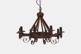 An iron eight-branch chandelier, of modern manufacture,