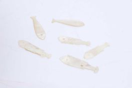 A collection of mother of pearl Chinese gaming counters, 19th century,