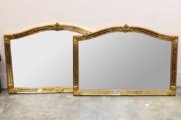 A pair of modern gilt and multi panel mirrors, of recent manufacture,